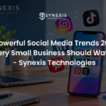 Small business owner planning social media trends 2026 on a phone and laptop with Reels and content ideas